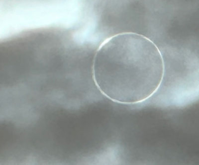 annular eclipse through the clouds