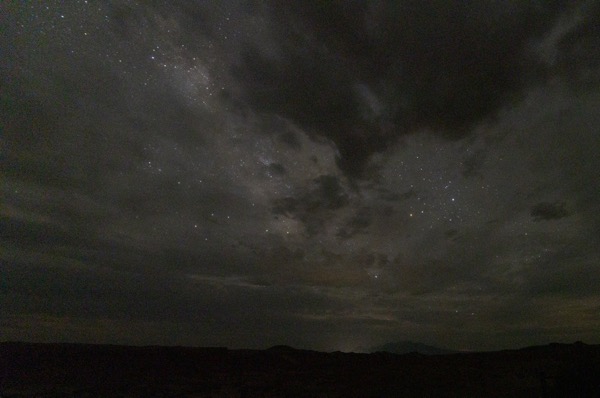 Milky Way through the clouds at Goblin Valley