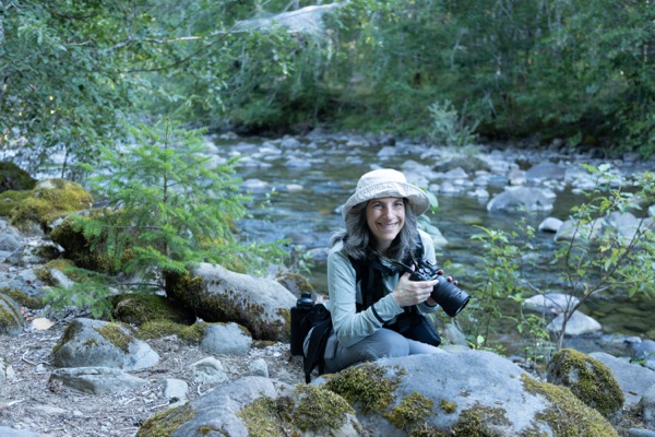 Cathy photographing along Skate Creek